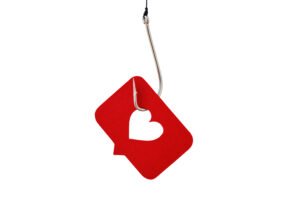 Fishing hook with social media like button on white background