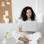 Woman Checking Out Computer